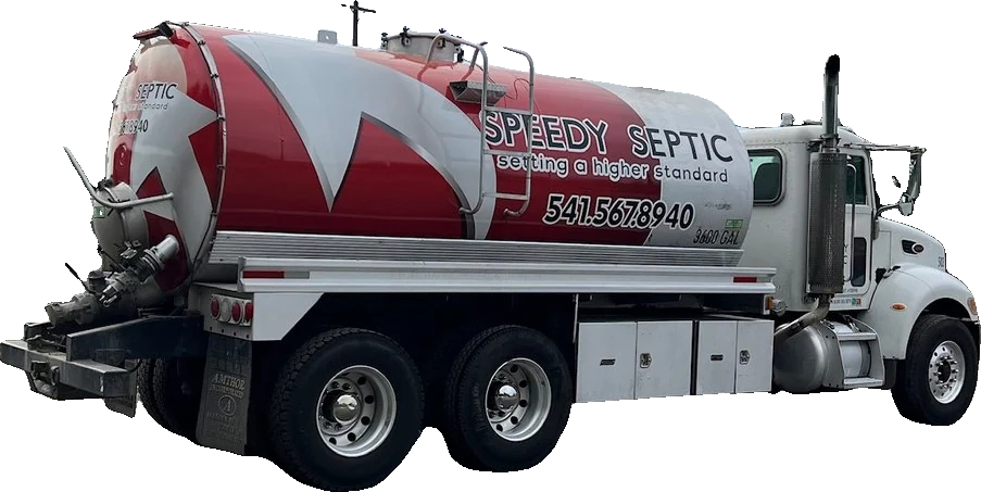 Speedy Septic vacuum truck with the red-and-white star tank wrap
